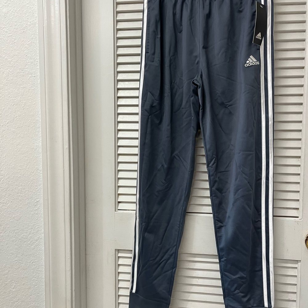 Adidas Kids Dark grey Joggers with White Stripes
Large 14/16